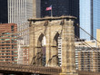 Brooklyn Bridge with USA flag - New York, NY, USA