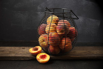 Canvas Print - Ripe peaches in basket