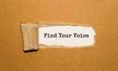 Wall Mural - The text Find Your Voice appearing behind torn brown paper