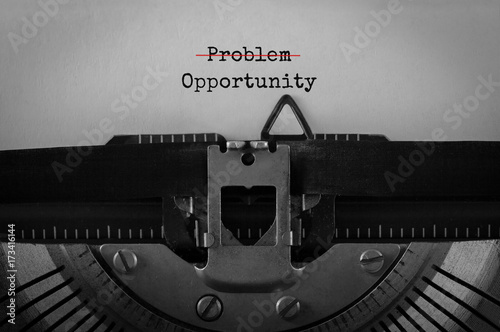 Fotografía Text Problem Opportunity typed on retro typewriter