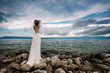 © Laszlo - Beautiful bride standing outdoor