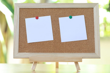 White notes on wooden boards and have copy space.