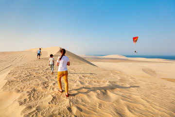 Family having fun at desert