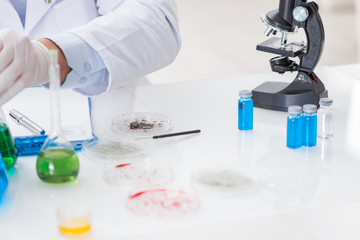 Male doctor working in the lab on virus vaccine