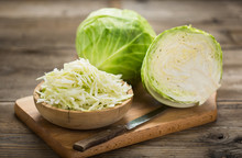 Fresh Cabbage On The Wooden Table