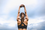Young woman stretching