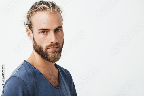 Close up of beautiful swedish man with stylish hairstyle and beard in ...
