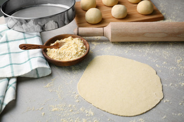 Sticker - Rolled dough for tortilla on kitchen table