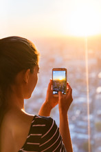 Tourist Girl Taking Phone Picture Of Sunset London Skyline View From The Shard. Europe Travel Tourism.