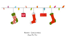 Merry Christmas And Happy New Year Greeting Card. Light Bulb, Christmas Socks And Gift Box
