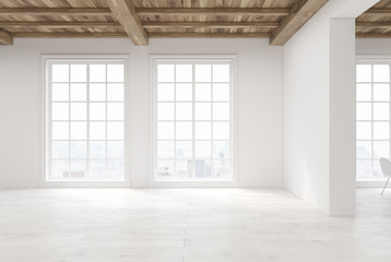 Empty room with large windows
