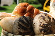Breads and baked goods. many different breads outside with beautiful nature background. food and drink. organic and healthy food concept.