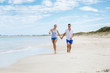 © Sergey Nivens - Romantic young couple on the beach