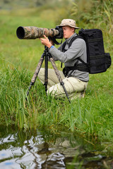 Wall Mural - Wildlife photographer outdoor