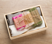 Handmade Soap And Towels In Wooden Box