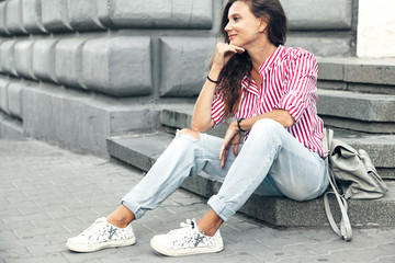 fashion model walking on the city street