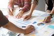 © Prathankarnpap - Creative talking or meeting plan design job in office with holding tablet for consulting.