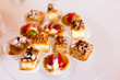 © aniad - Variety of cakes on a glass plate.