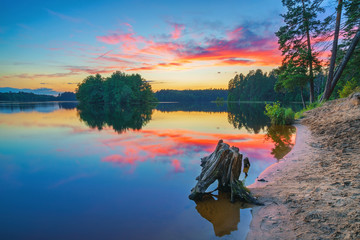 Wall Mural - Beautiful landscape with corful sunset over the forest lake