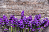 Fototapeta Lawenda - Lavender flowers, frame background, flat lay from above