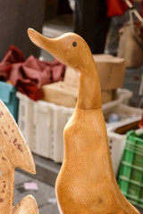 Wall Mural - wooden duck on sale at street market, Chiavari , Italy