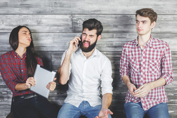 Poster - Caucasian adults using electronic gadgets