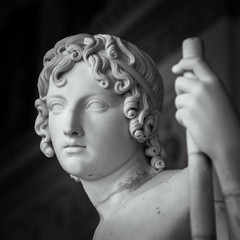 Head and shoulders detail of the ancient sculpture