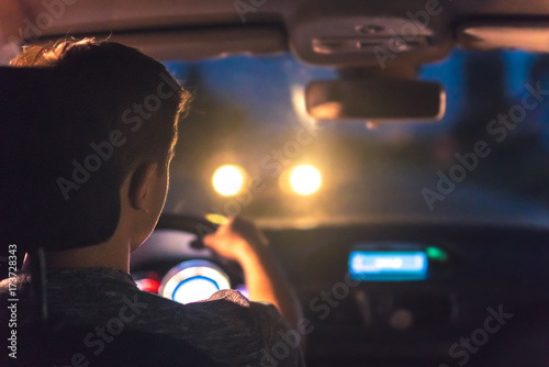 Cuadros en Lienzo The man drive a car. evening night time
