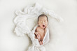 © yuko hirao/Stocksy - Simple portrait of a yawning newborn baby
