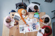 © Aila Images/Stocksy - Interior designers planning new creative  project in office
