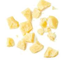 Parmesan Cheese Pieces On White Background. Italian Cheese Slices. Top View.