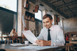 © hetmanstock2 - businessman in cafe