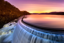 Sunrise Over Croton Dam, NY And Its Stepped Spillway Waterfall. A Very Long Exposure And The Natural Motion Blur Creates An Artistic Smooth And Silky Effect On The Falling Water.
