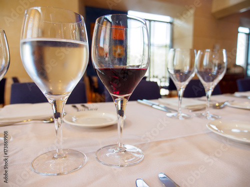 Close Up Wide Angle Of A Glass Of Water And Red Wine On A Set Table With Plates And Silverware Before A Gala Dinner Valencia Spain Travel And Gourmet Cuisine Concept Buy