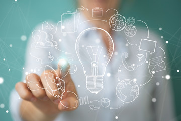 Leinwandbilder - Businesswoman touching and holding sketch lightbulb