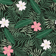  Tropical background with palm leaves and flowers. Seamless floral pattern