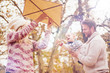 © chika_milan - Mother and father playing with son in park at autumn/ flying kite