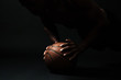 © Drobot Dean - Cropped photo of afro american basketball player,  doing pushup exercise on the ball