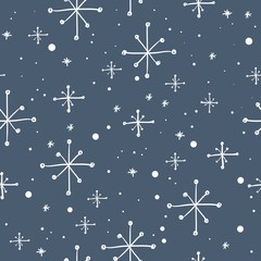 Vector seamless hand drawn snowflakes pattern. Winter background.