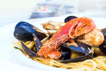 Wall Mural - Spaghetti with Shrimp and Mussels on a the table