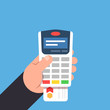© shendart - Payment by bank card. Payment terminal in the person hand. Flat vector isolated illustration.