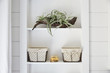 © Trinette Reed/Stocksy - Shelving in rustic farmhouse bathroom