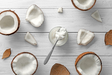 Poster - Composition with fresh coconut oil on wooden background