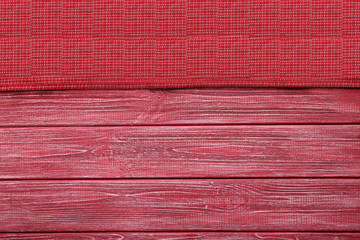 Wall Mural - Napkin on red wooden table, close up