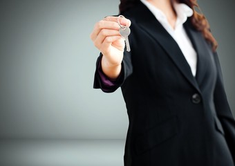 Poster - Woman Holding key in front of vignette