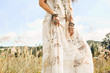 © zolotareva_elina - close up of beautiful young woman in white dress on a field