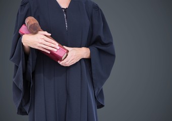 Poster - Female judge mid section with book and gavel against grey