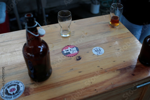 A Sticker With The Logo Of Social Club Brewery Is Seen On A Table