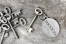 Key Of Success On Wooden Plank