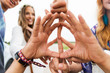 © Syda Productions - hands of hippie friends showing peace sign